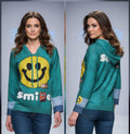Missy Hoodie Smiley Türkis – Pailletten & Smile-Print | Kapuze | Gr. 36–44